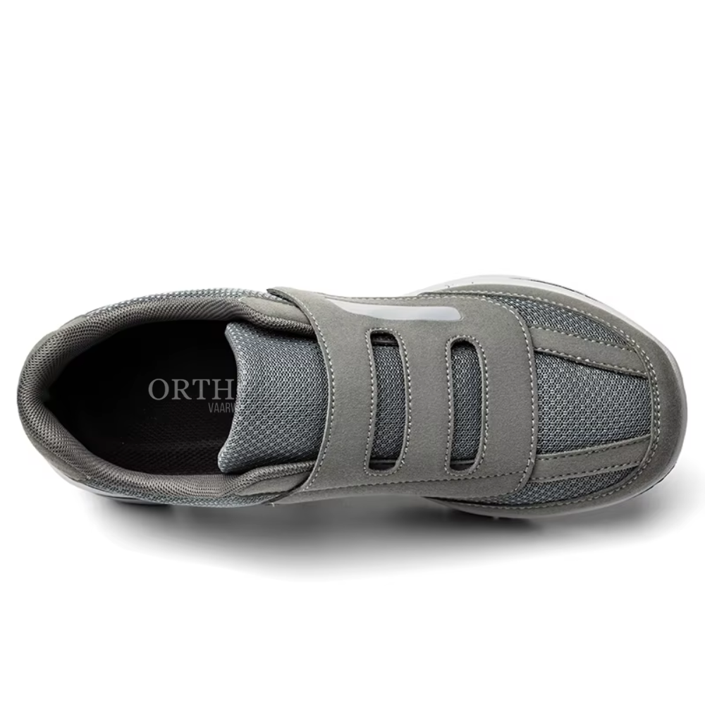 Pair of women's wide fit orthopedic slip-on comfort shoes, adjustable for optimal foot support & daily wear.