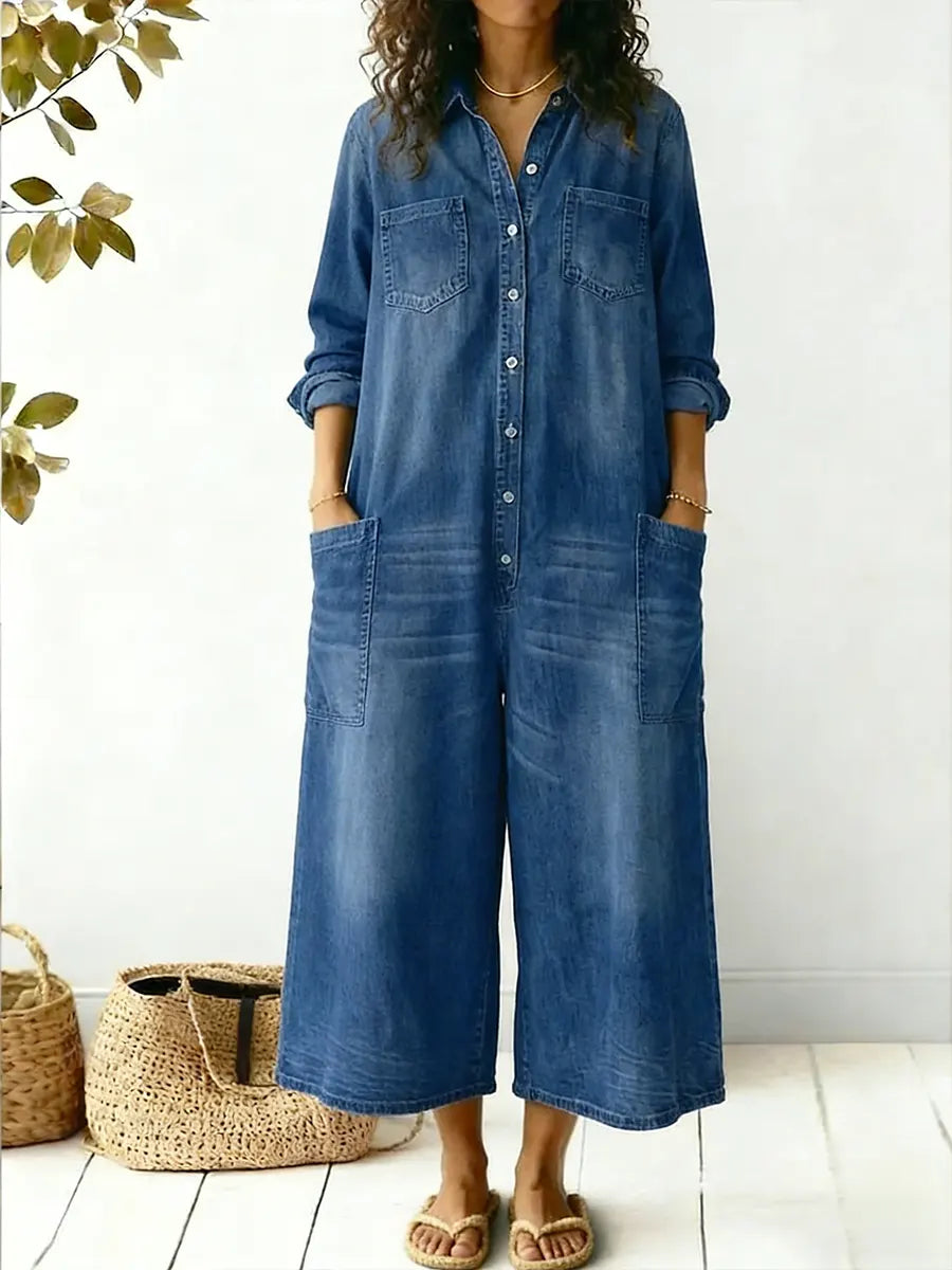 Relaxed fit women's wide leg jumpsuit with button-up front & pockets. Versatile for spring, summer, fall.