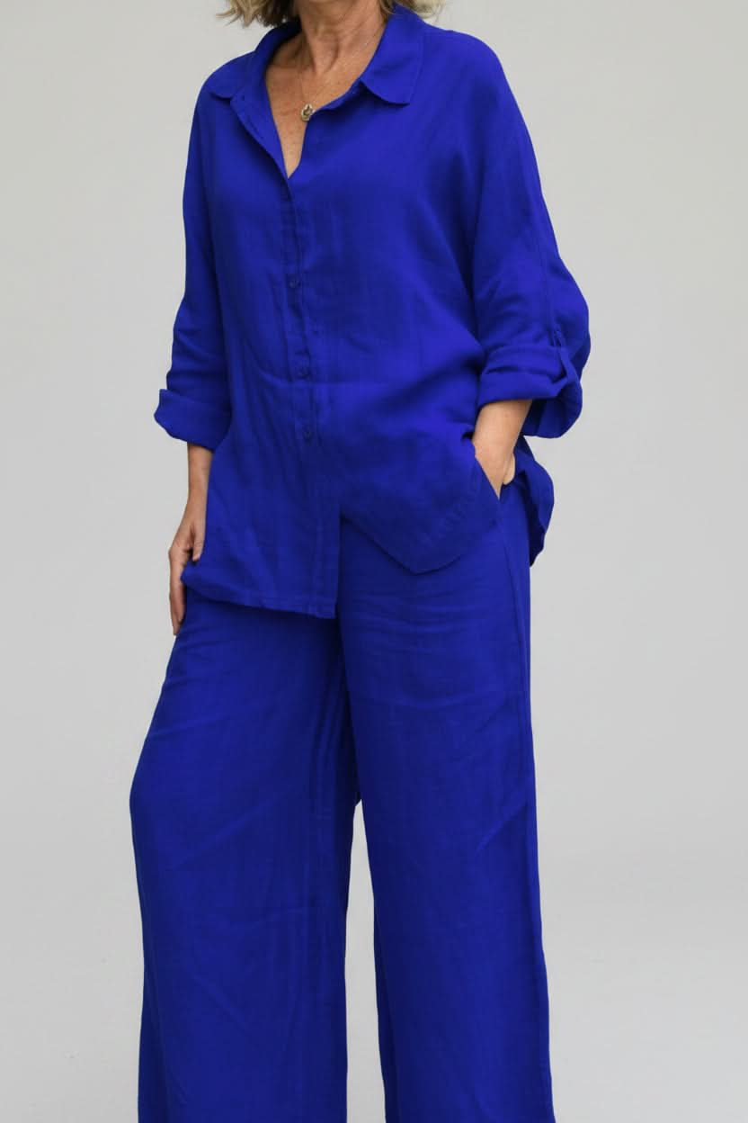 Chic women's wide leg pants and top co-ord set. Matching two-piece outfit, ideal for comfortable, relaxed casual wear.