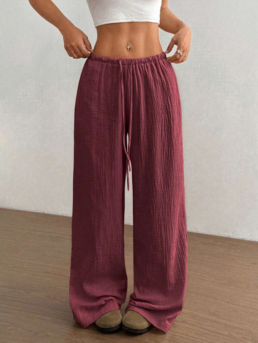 Relaxed fit wide leg pants for women, featuring a chic crinkle texture fabric & drawstring elastic waist.