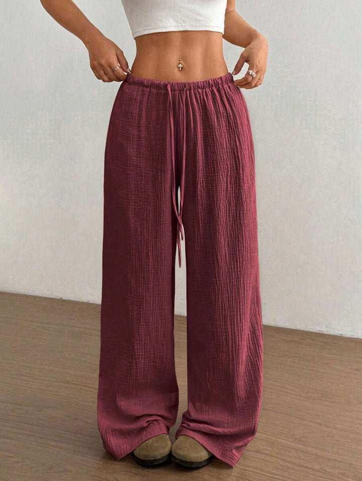 Relaxed fit wide leg pants for women, featuring a chic crinkle texture fabric & drawstring elastic waist.