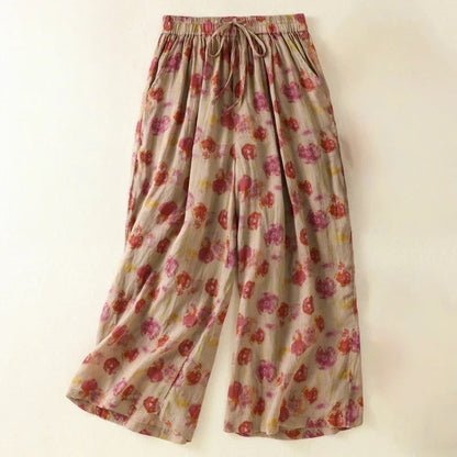 Women's wide-leg flowy pants in a relaxed fit, perfect for comfortable summer casual wear or elegant vacation outfits.