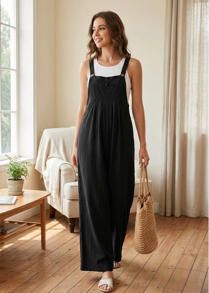 Women's wide-leg jumpsuit with adjustable button straps, perfect for casual summer wear.
