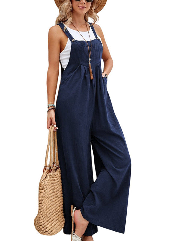 Bohemian-style women's wide-leg jumpsuit with pockets & adjustable straps, great for summer fashion.