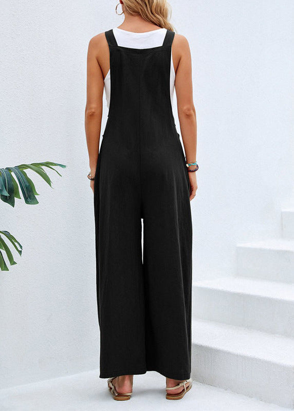Women's pocketed wide-leg jumpsuit with adjustable button straps, a comfortable and casual summer essential.