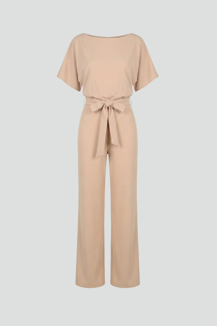 Women's wide leg short sleeve jumpsuit with an elegant belt. Comfortable & versatile for summer fashion.