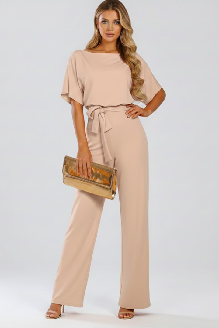 Chic belted wide leg jumpsuit for women. Features short sleeves, perfect for comfortable one-piece style.