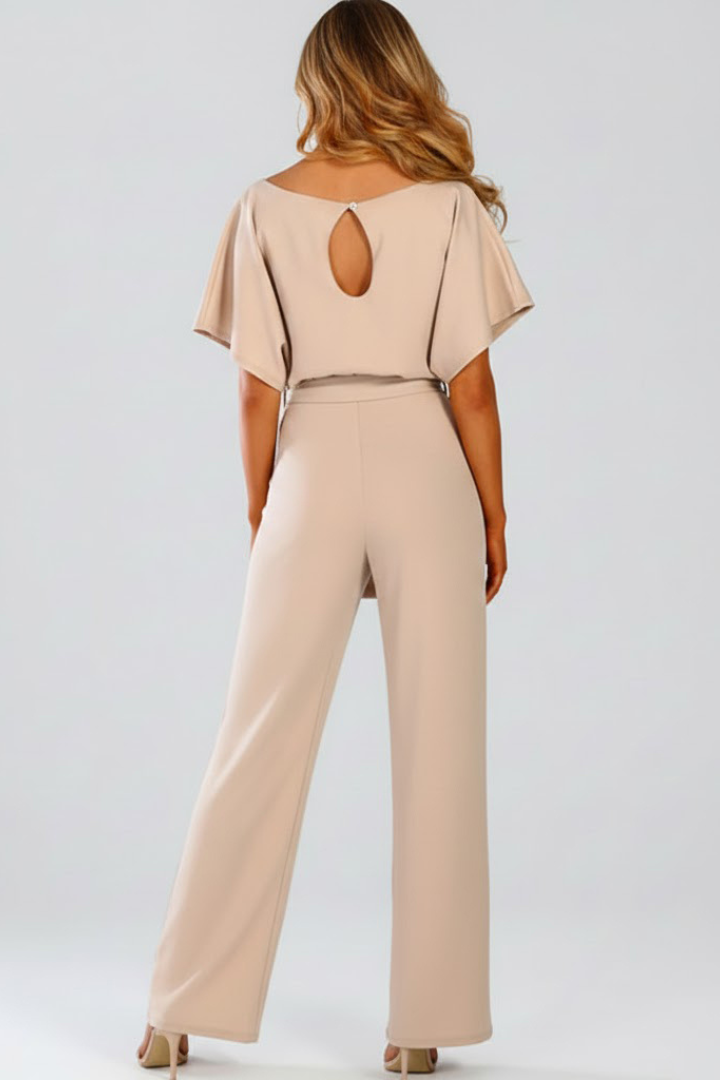 Flowy women's wide leg short sleeve jumpsuit with a flattering belt. Ideal for spring & summer comfort.