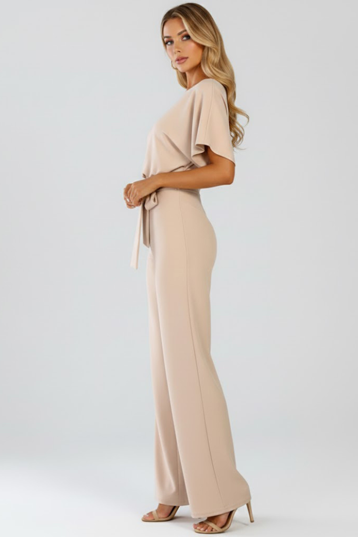 Elegant short sleeve wide leg jumpsuit for women, cinched with a stylish belt. Versatile for any occasion.