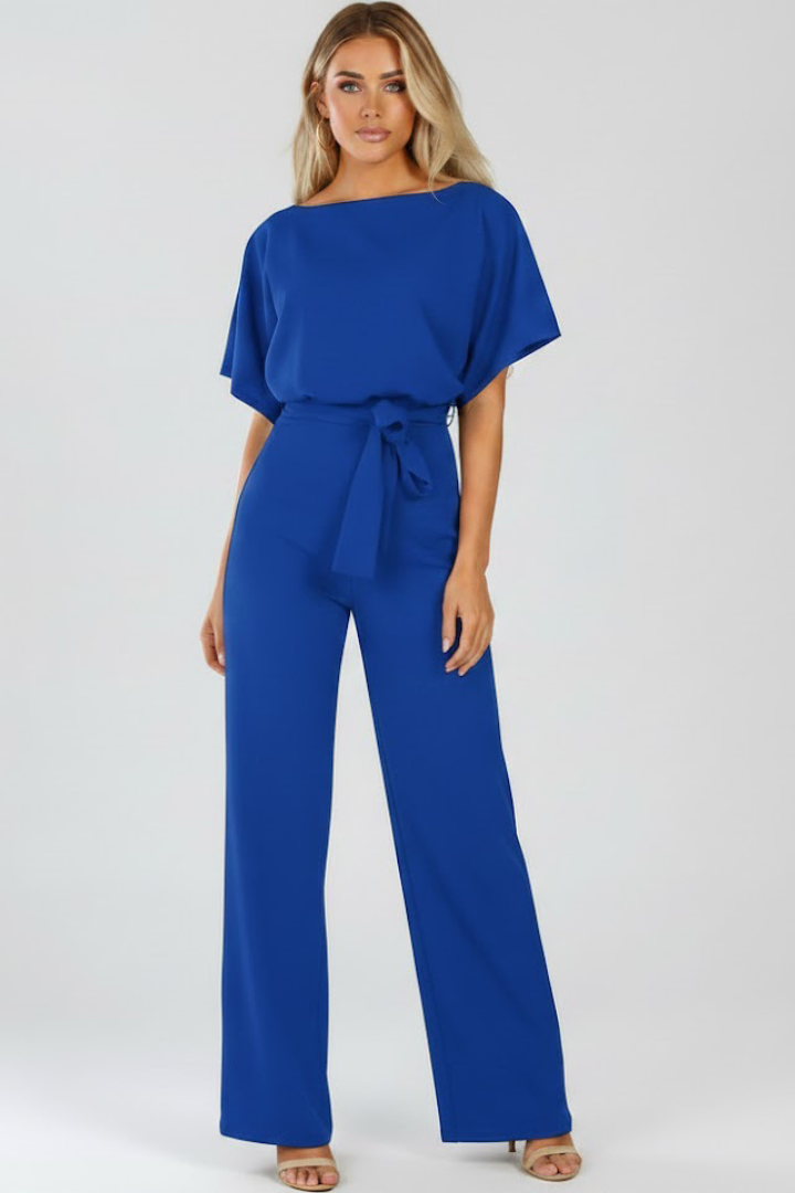 Detail of the flattering belt on a women's wide leg short sleeve jumpsuit, enhancing the chic one-piece.