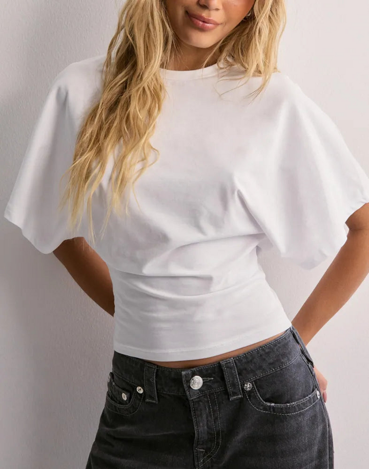 Stylish women's wide sleeve t-shirt, perfect for office or casual everyday comfort. Versatile ladies fashion top.