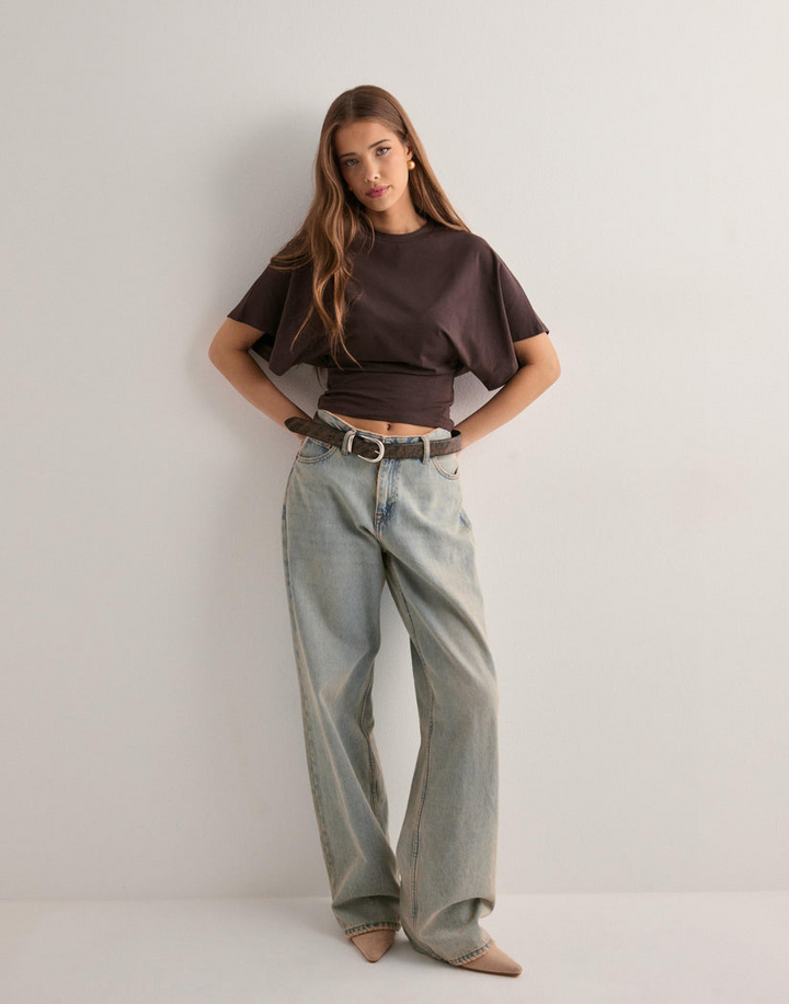 Comfortable women's wide sleeve t-shirt in modern style. Short sleeve top for stylish ladies everyday wear.