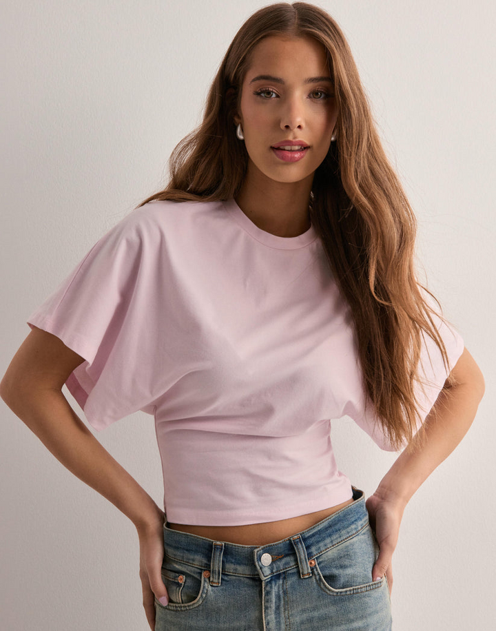 Modern women's wide sleeve t-shirt for versatile everyday comfort & style. Casual short sleeve top for ladies.