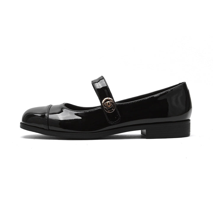 Modern women's Mary Jane flats, wide toe box, arch support, sleek design.