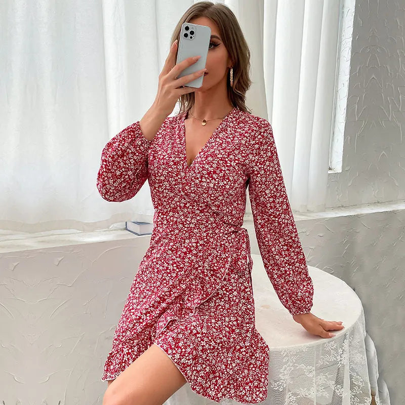 Women's wine red floral print ruffle mini wrap dress. Features V-neck, long sleeves, and a flattering tie waist design.