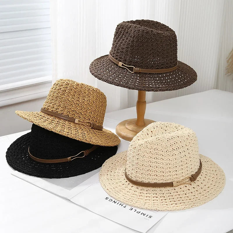 Faux leather band details this women's stylish woven fedora sun hat, featuring a wide brim for summer.