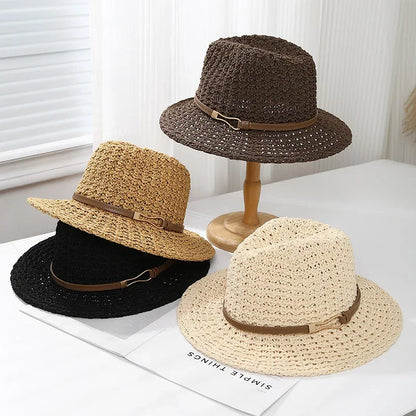 Faux leather band details this women's stylish woven fedora sun hat, featuring a wide brim for summer.