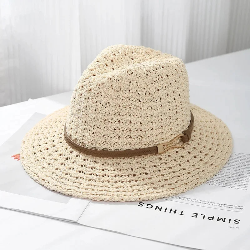 Protect with this women's wide brim woven fedora sun hat, perfect for beach days & stylish summer wear.