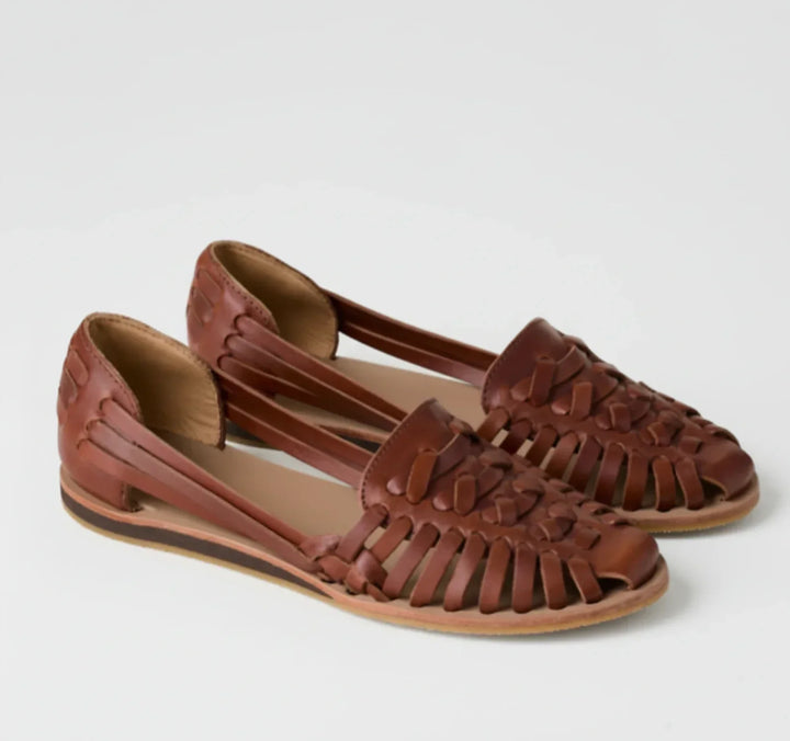 Stylish women's open-back woven mules. Orthopedic comfort shoes, easy slip-on design for casual summer fashion.