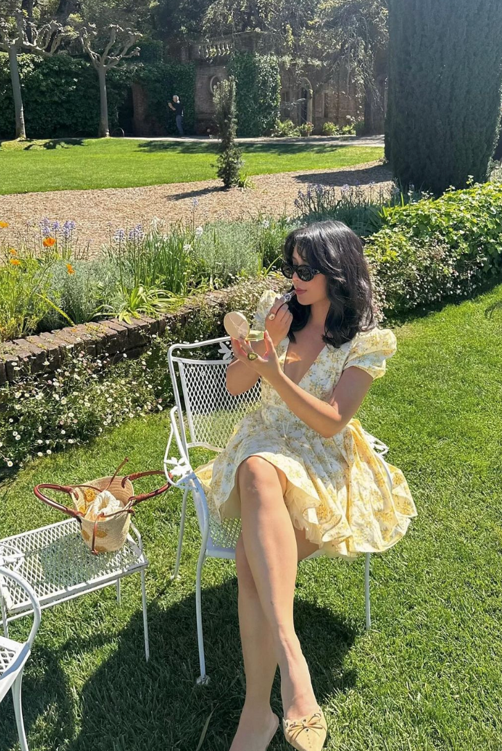 Summer women's floral mini dress with puff sleeves, open back. Casual yet elegant yellow dress.