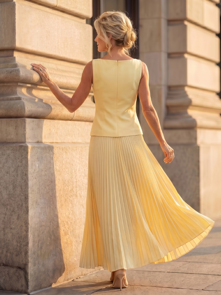 Sky blue structured bodice top & pleated maxi skirt two-piece set for women, perfect for summer.