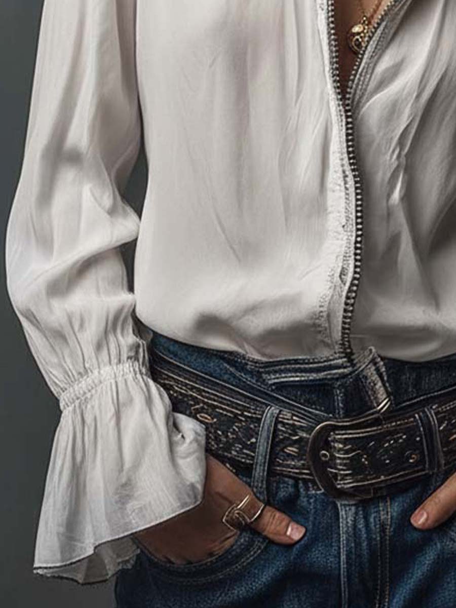 Elegant women's blouse with a full zip front & sophisticated bell cuffs.