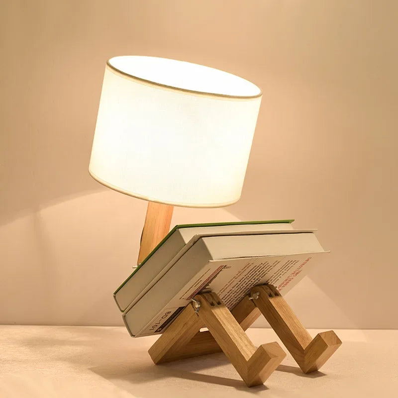RutanFlex wooden robot table lamp with adjustable body & book holder; a unique desk lamp for modern decor.