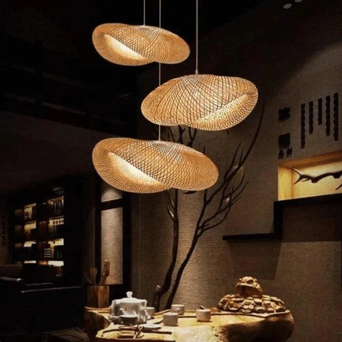 Bohemian style woven rattan pendant light, handmade for natural and modern rustic interiors.