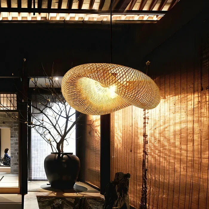 Natural rattan ceiling fixture, a handmade woven light for modern rustic home decor.