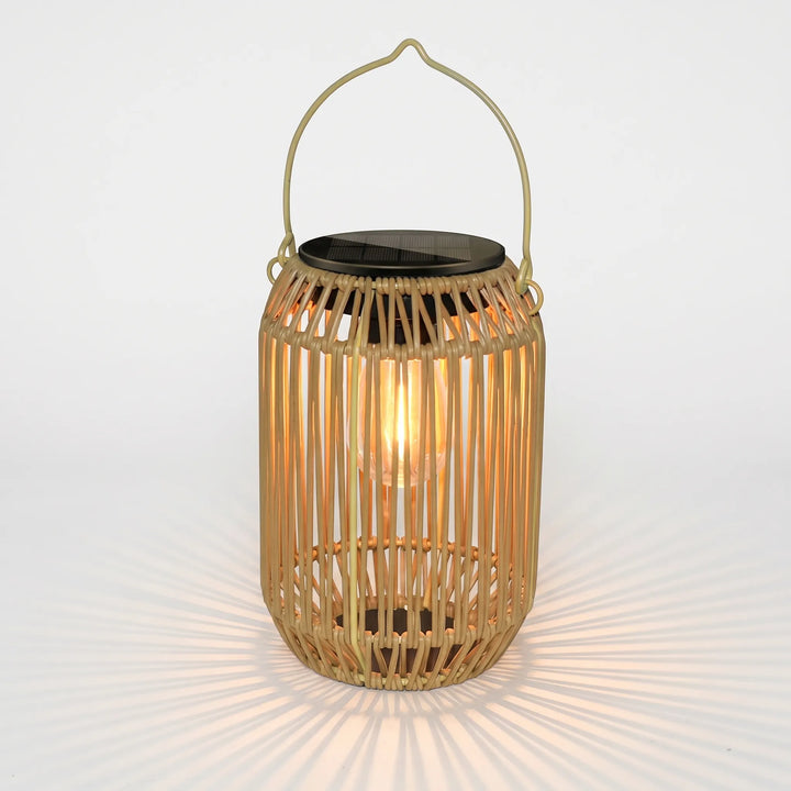Decorative rattan solar lantern, weatherproof & cordless, perfect ambient light for patio & garden.