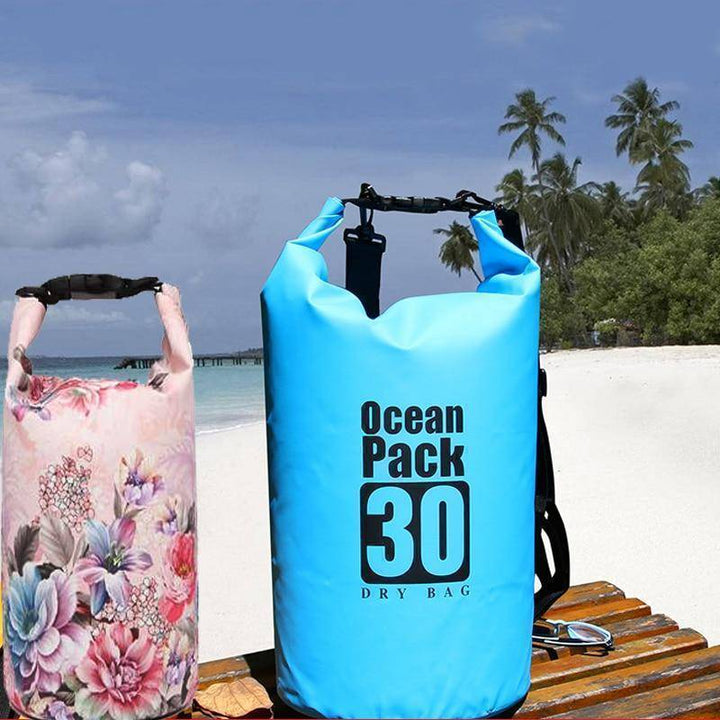Yellow waterproof dry bag for camping and boating, durable outdoor gear for hiking.