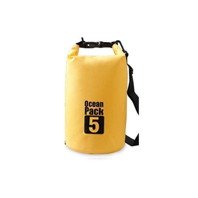 Stack of folded waterproof dry bags, compact storage for any adventure.