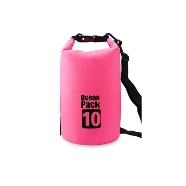 Waterproof dry bag next to a tent, ideal for camping and keeping items dry.