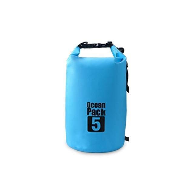 Overhead view of multiple waterproof dry bags in a boat, essential boating gear.