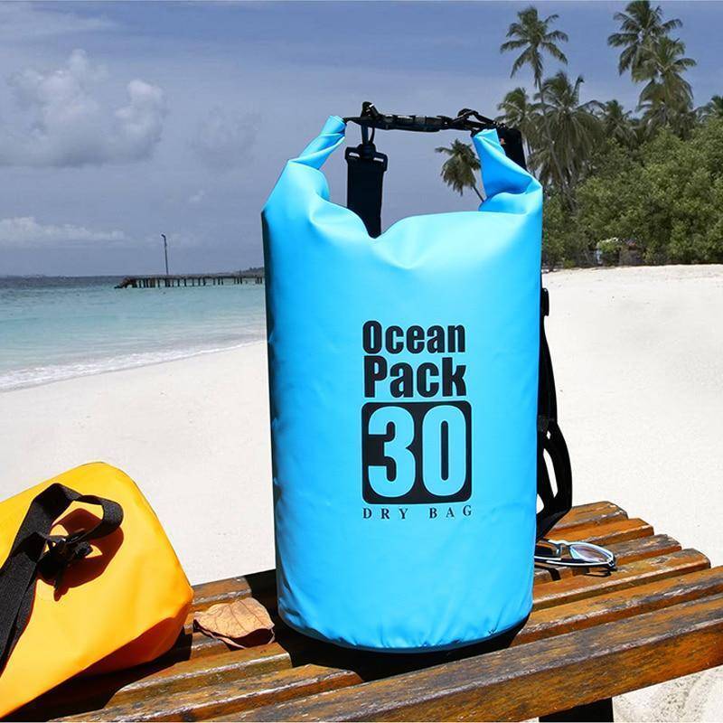 Orange waterproof dry bag, essential outdoor gear for kayaking and water sports.