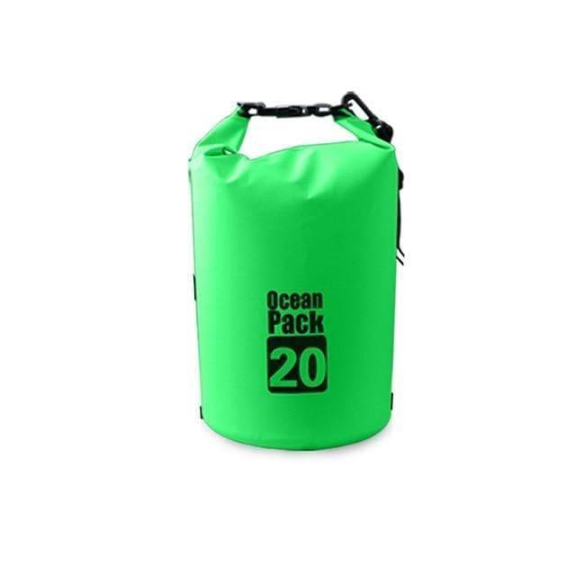 Waterproof dry bag propped against a tree, perfect for a hiking rest stop.